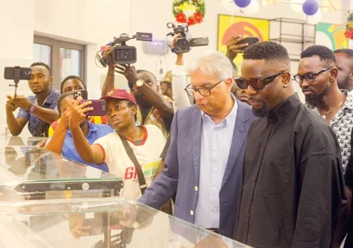 Ramesh Sadhwani with Michael Owusu Addo, known as Sarkodie, at the Accra Mall opening, as captioned by Graphic.